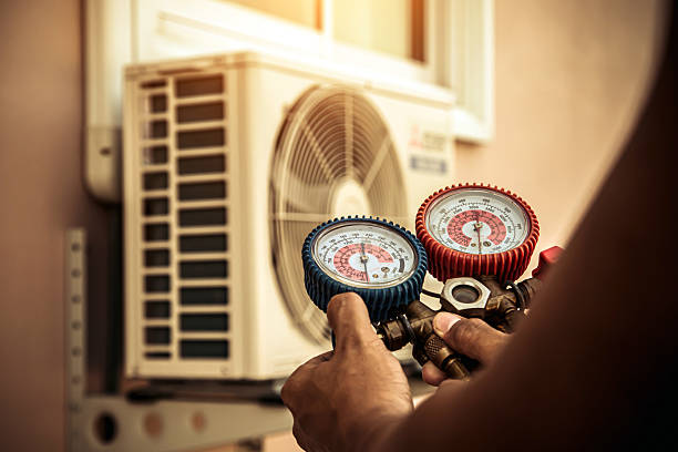 Professional Heat Pump Repair technician working in Aurora, OH